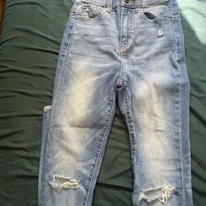 Brand sneak peek. Size one. Skinny Jean, high-rise, distressed.
